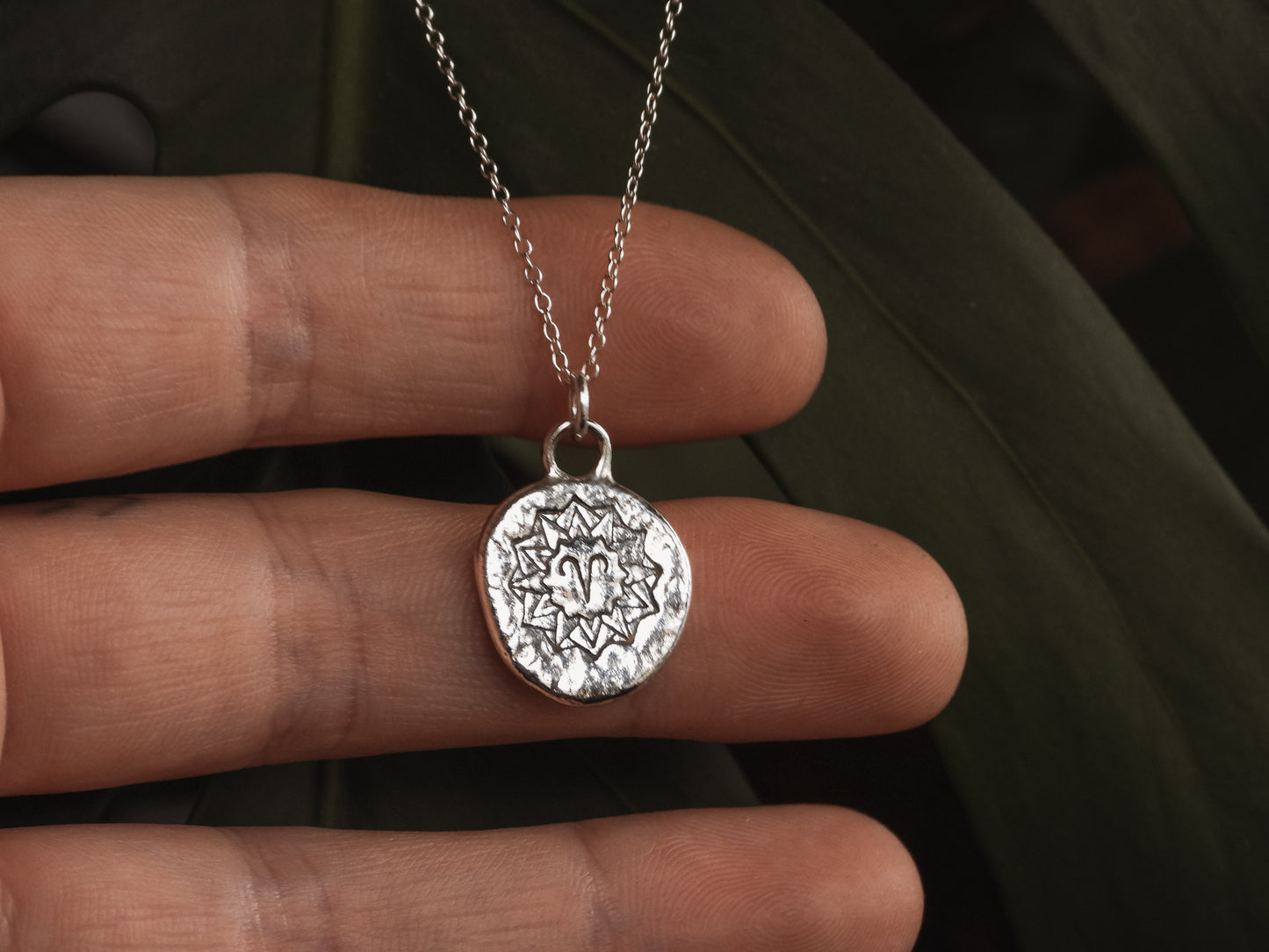 recycled sterling silver aries coin necklace with zodiac symbol