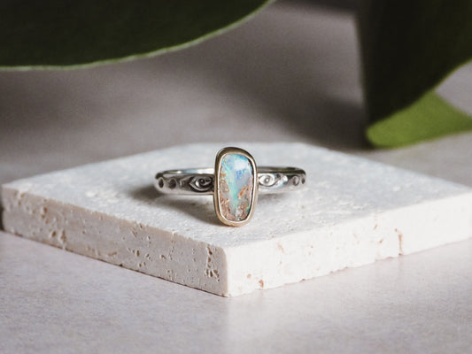 Australian boulder opal ring in mixed gold and silver ring