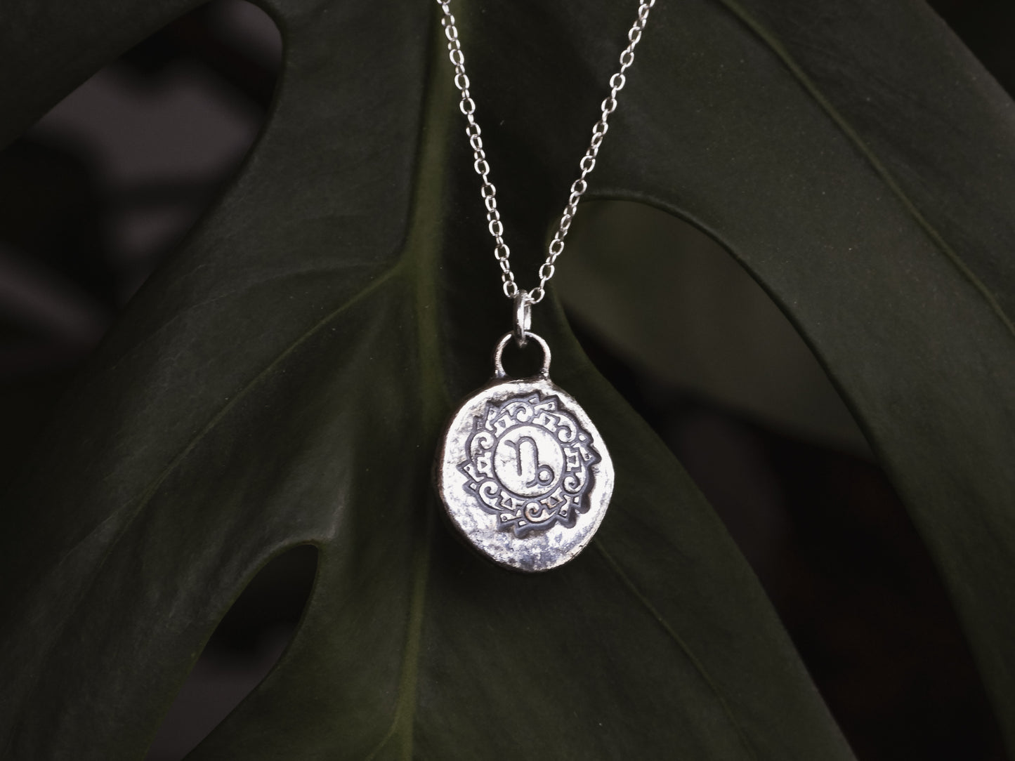 boho style mandala necklace with engraved Capricorn symbol