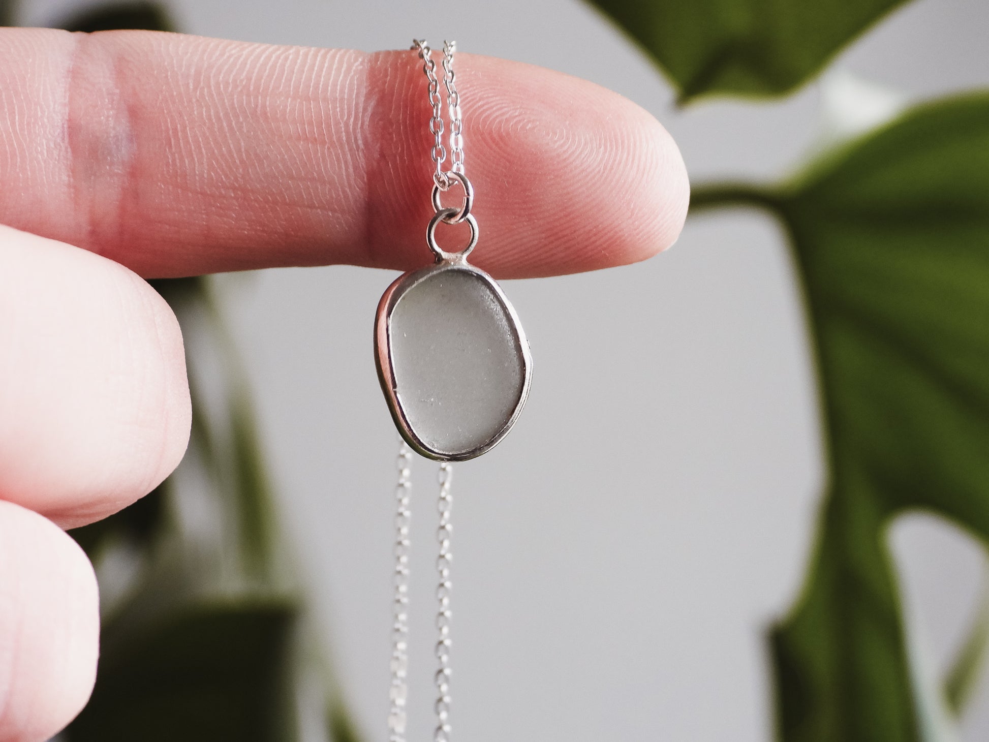 minimalist charm necklace with grey Cornish seaglass