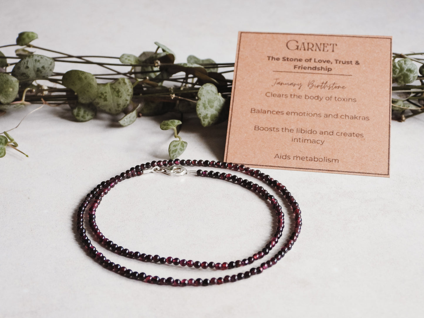 red garnet crystal healing choker with healing properties card