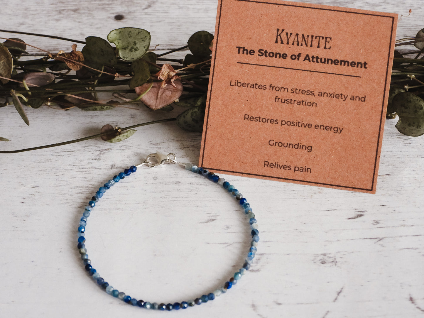 blue kyanite gemstone beaded bracelet with properties card