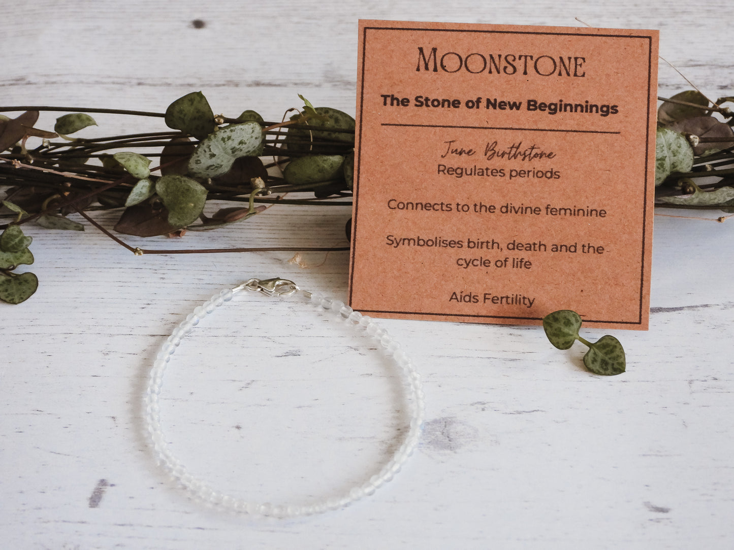 moonstone gemstone beaded gemstone bracelet with properties card