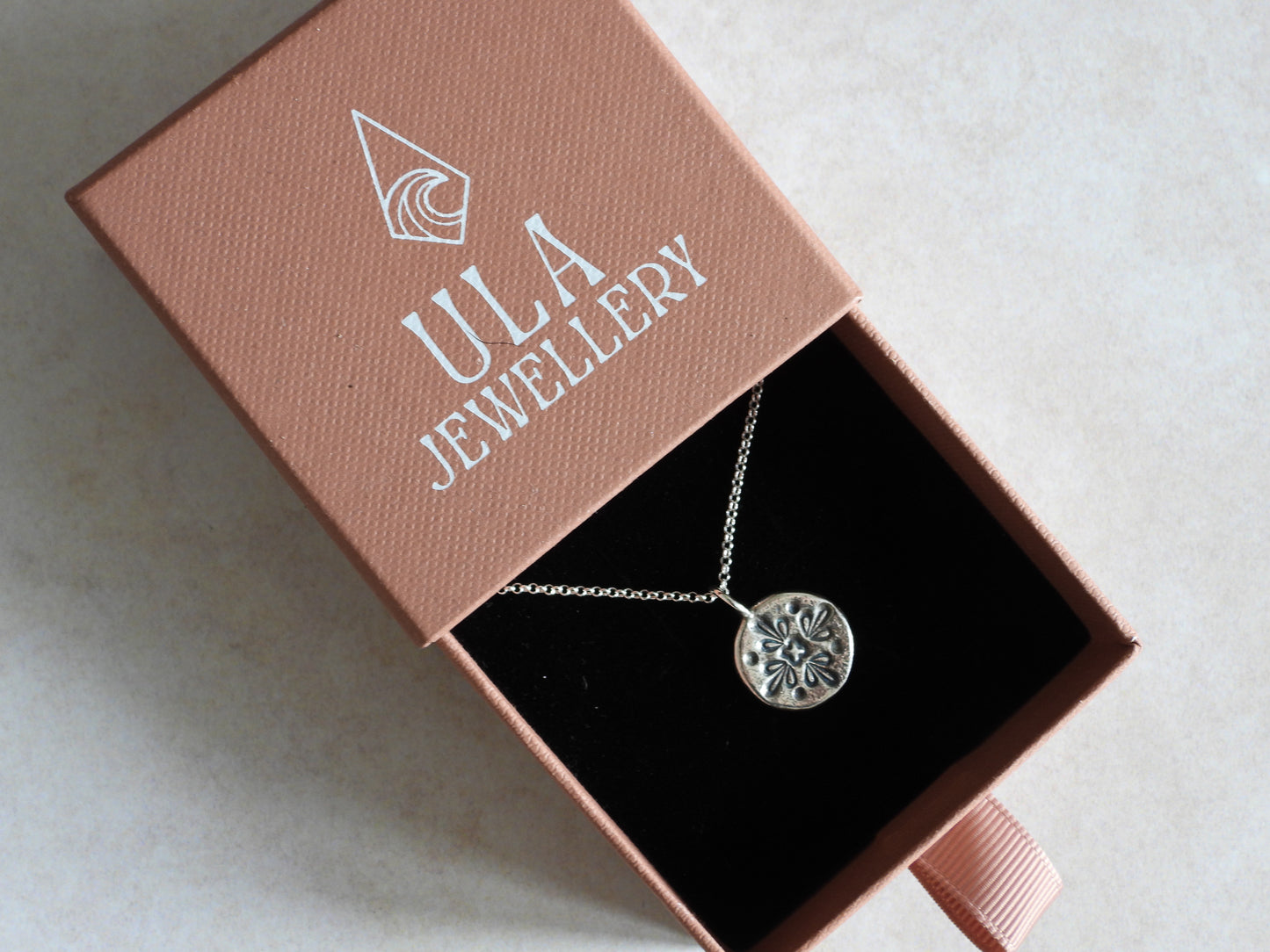 mandala charm necklace in Ula Jewellery box