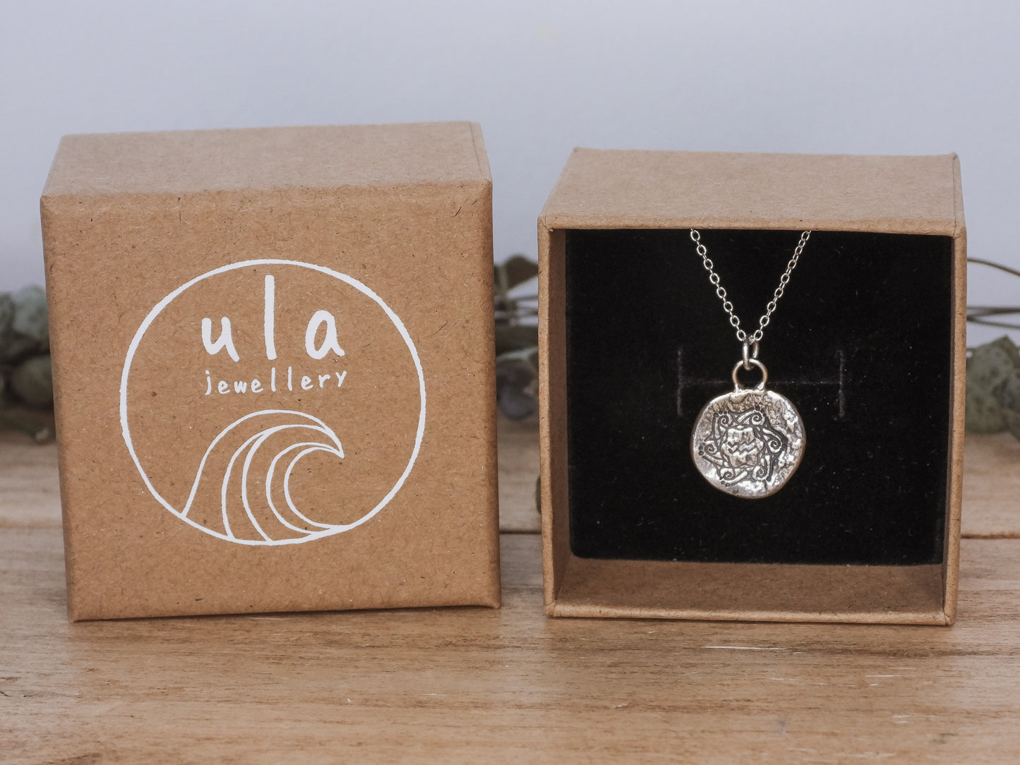 recycled silver pendant by ula jewellery with engraved star sign