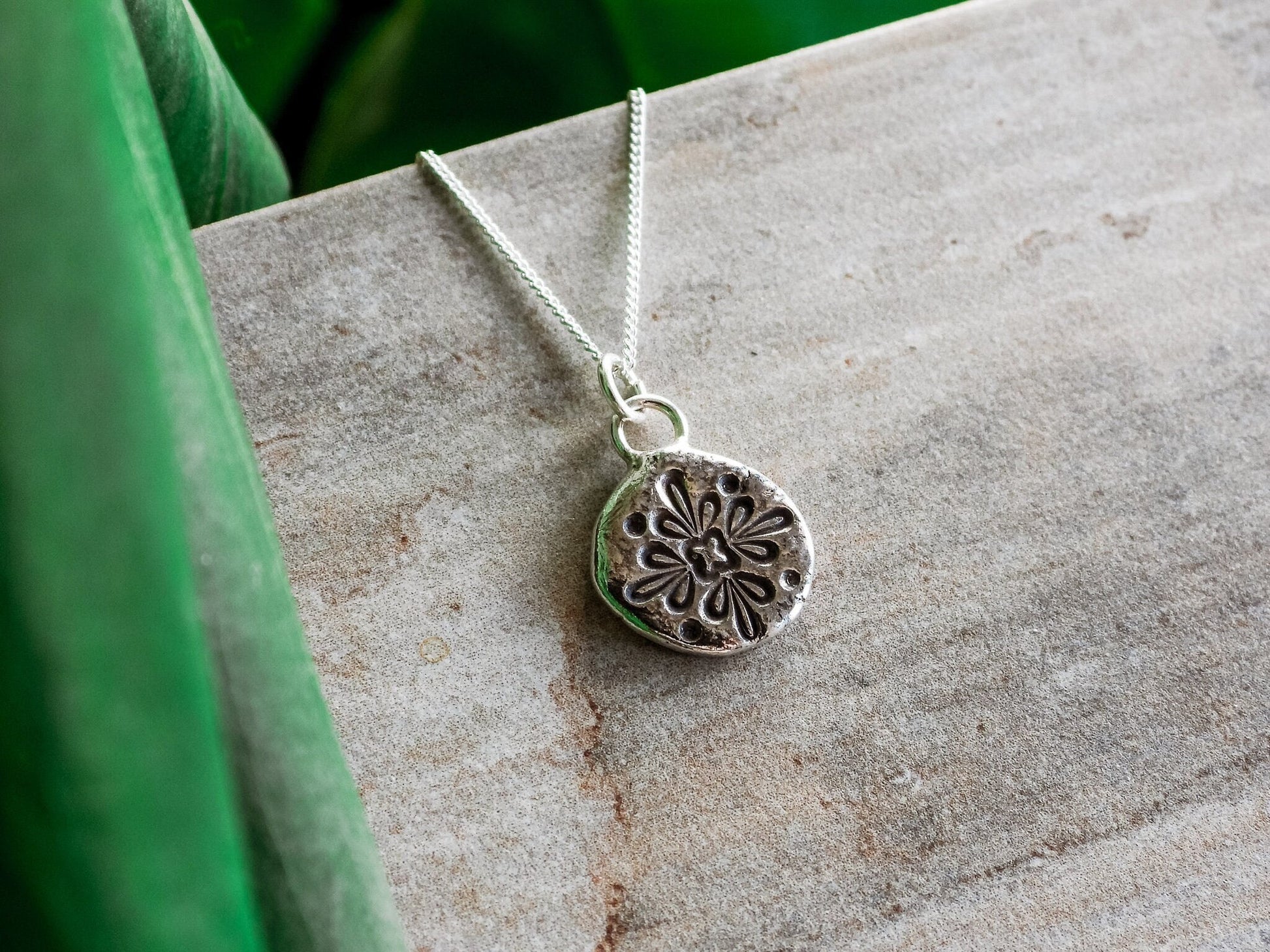 dainty handmade mandala charm necklace in a boho style